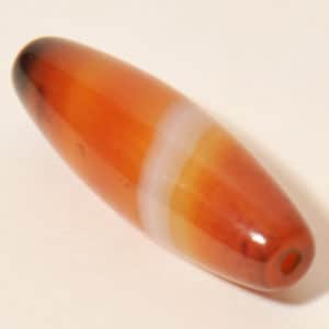 Бусина дзи из агата