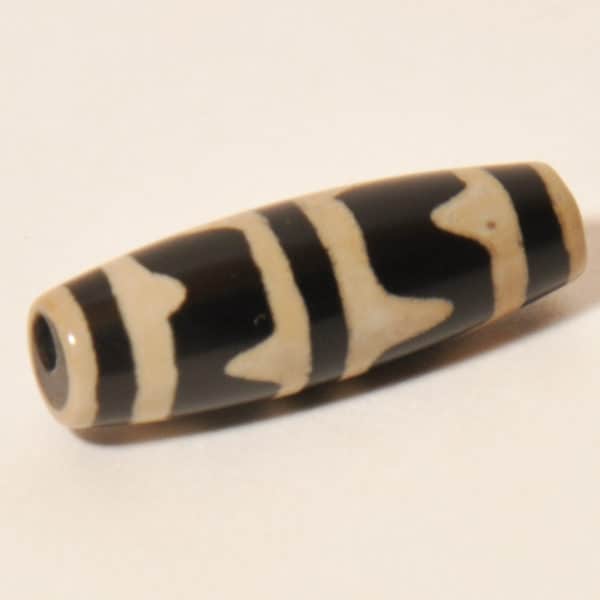 Бусина Дзи Клык Тигра