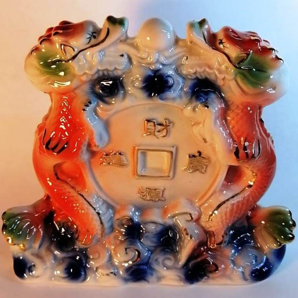 Два дракона с жемчужиной на монете 2